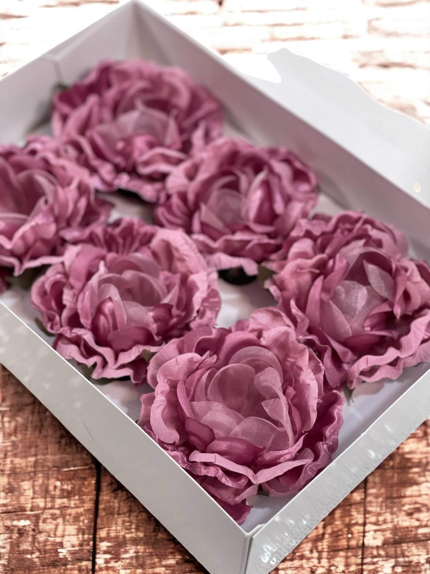 rose gold fabric flowers 6 in a box on a wooden surface
